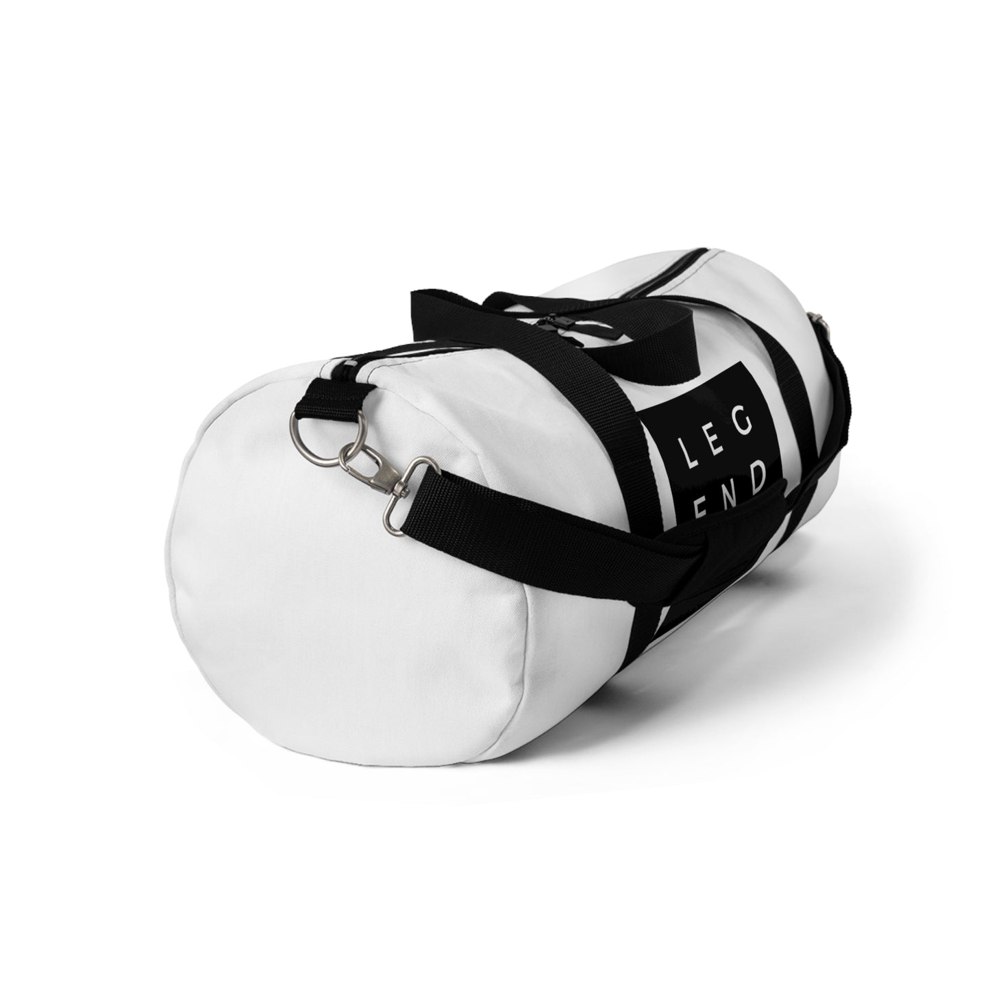 
                  
                    White duffel bag with black crossbody strap and metal ring hardware
                  
                
