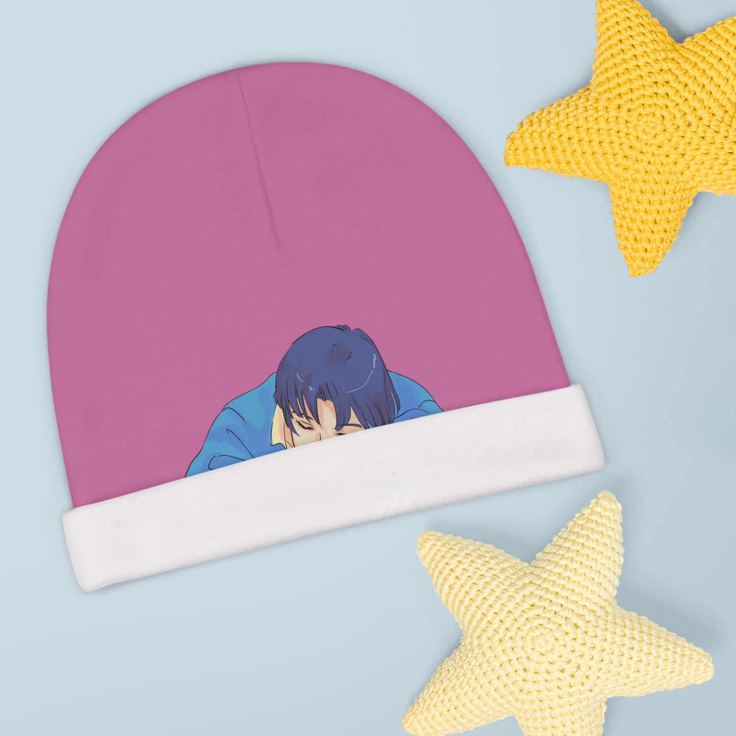 
                  
                    Pink baby beanie with anime graphic and white ribbed cuff
                  
                