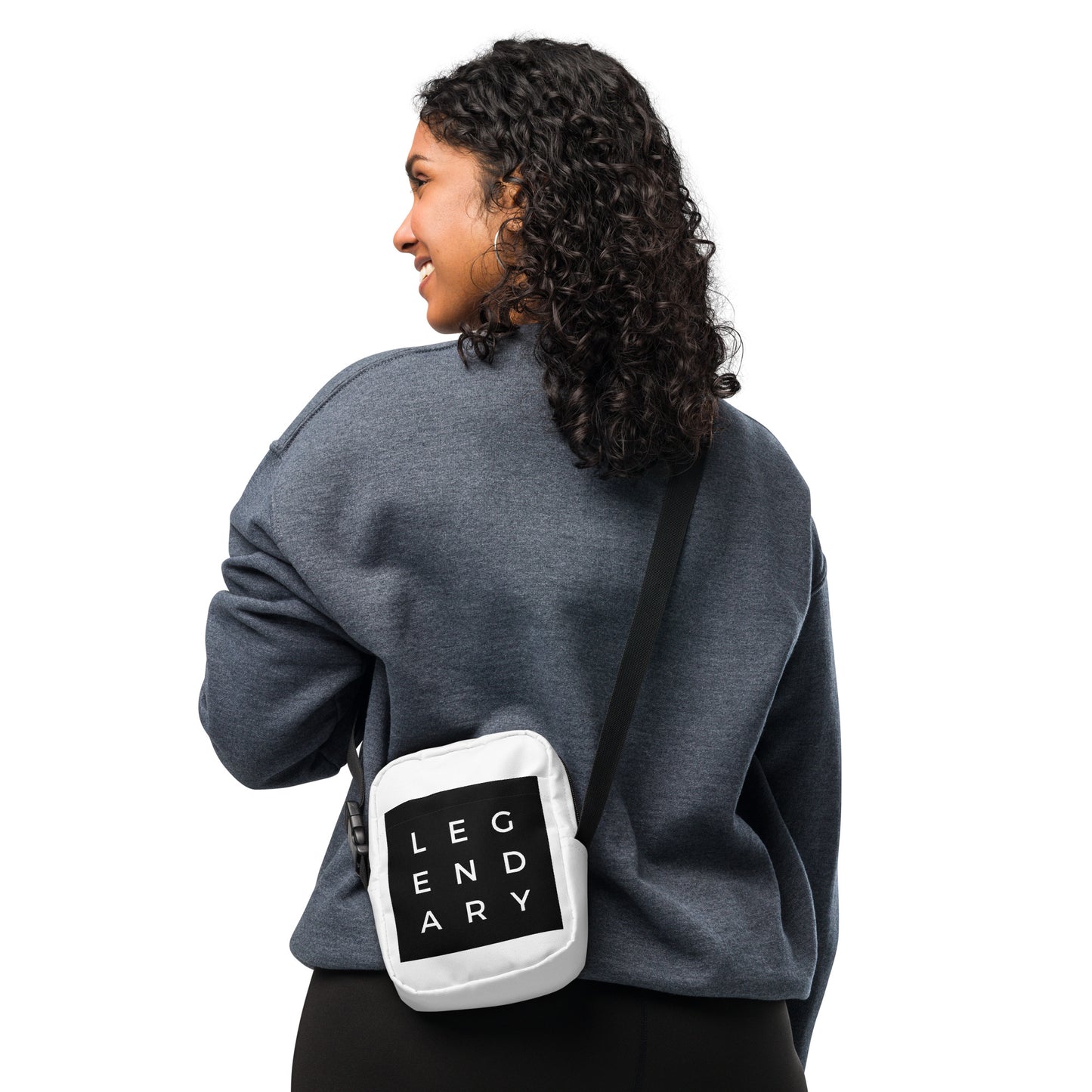 
                  
                    Black and white utility crossbody bag with LEGENDARY logo panel and adjustable strap
                  
                