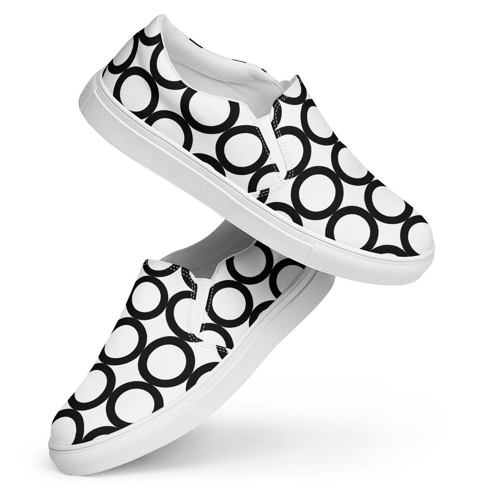 
                  
                    Black & White Men’s Slip-On Canvas Shoes | Comfortable and Casual for Everyday Wear
                  
                