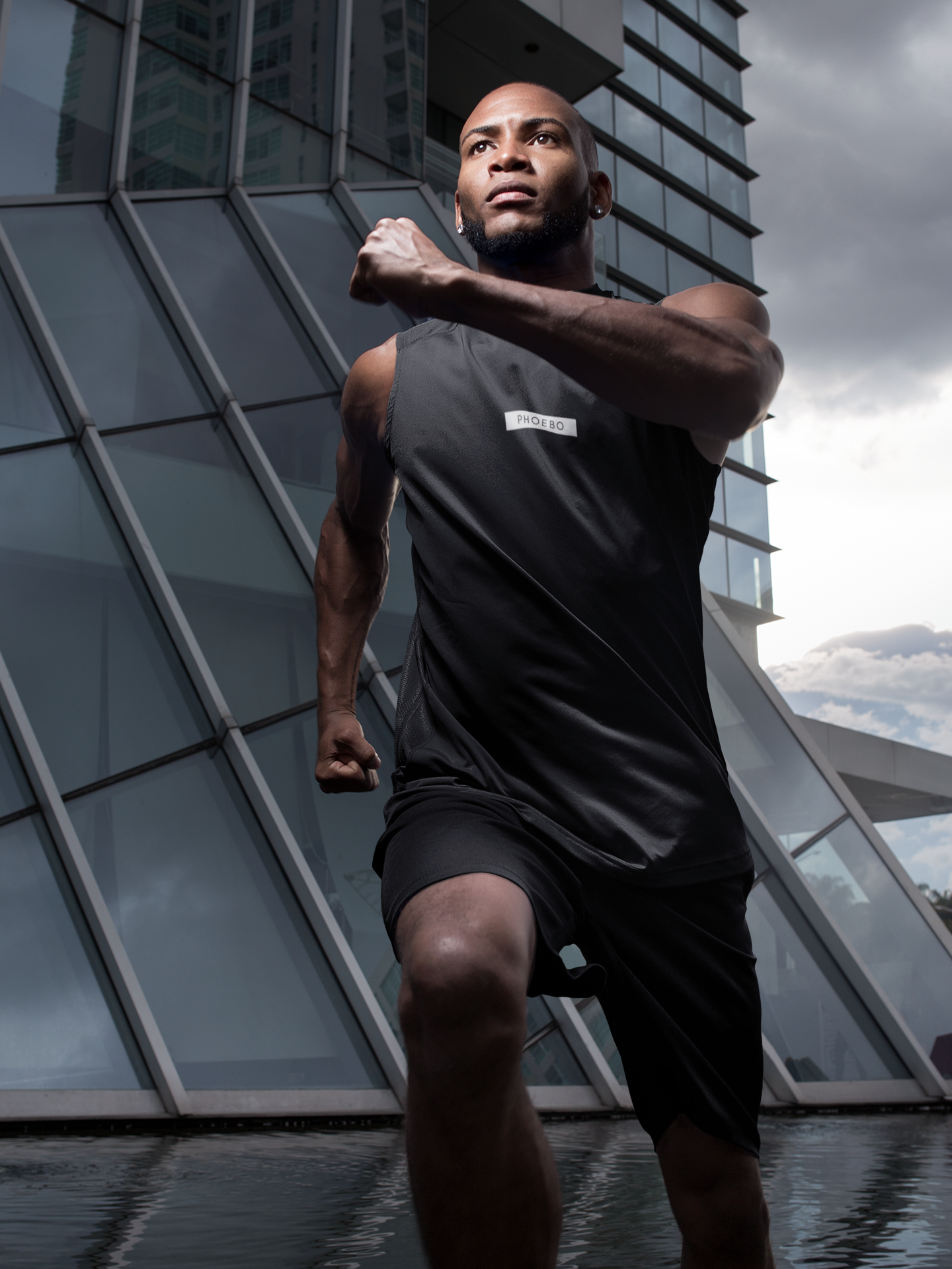 
                  
                    Phoebo Black Muscle Shirt | Sleek Fit for Active and Casual Wear
                  
                