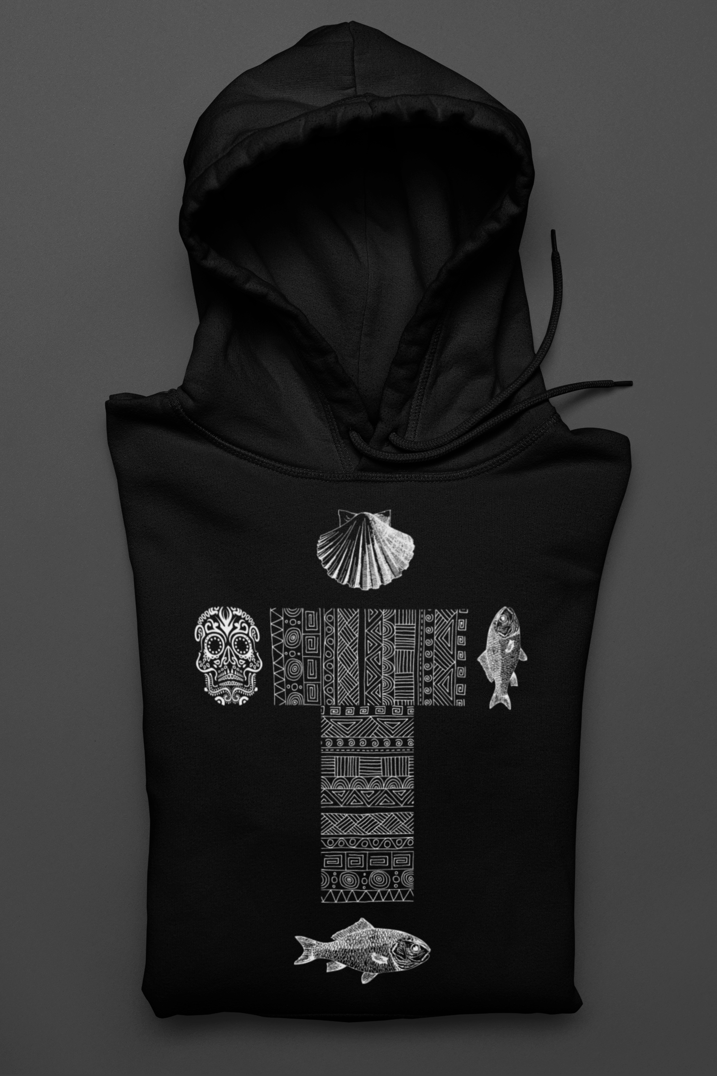 
                  
                    Black unisex raglan hoodie flat lay with hood and front skull fish shell graphic
                  
                
